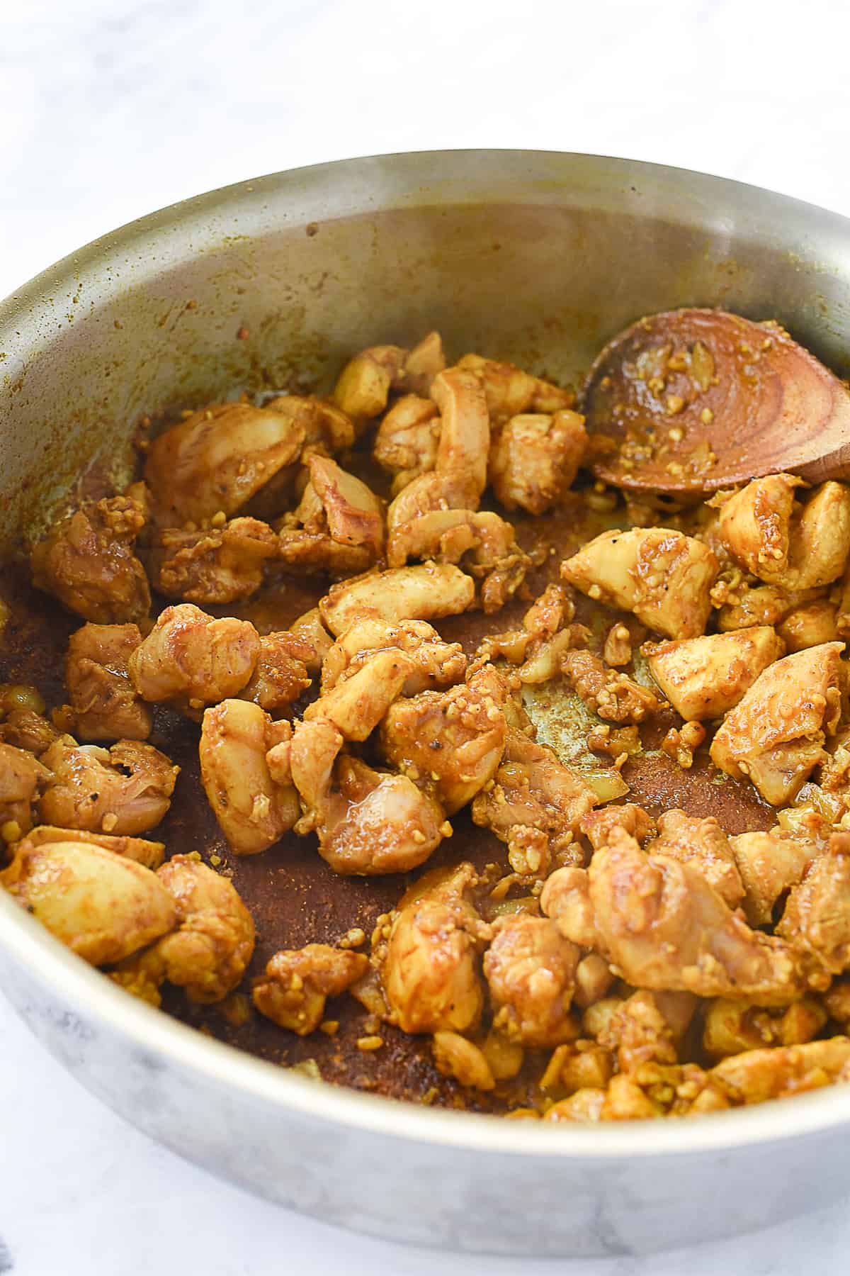 chicken curry in a frying pan