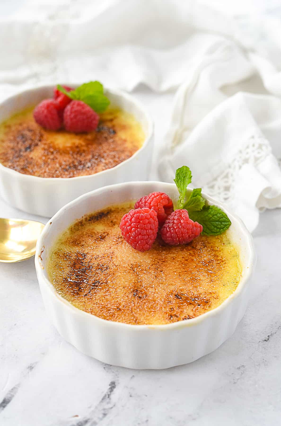 two ramekins of creme brulee