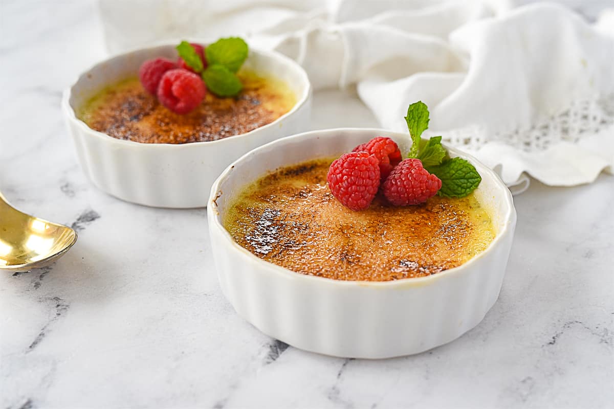 creme brulee with raspberries on top