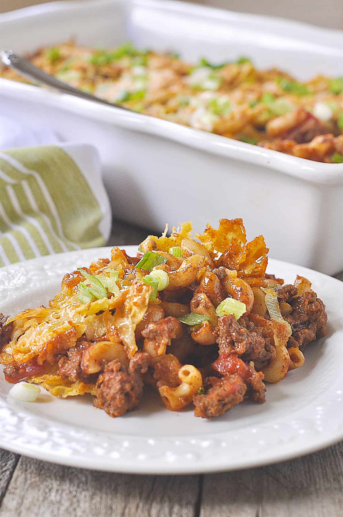 TACO PASTA BAKE ON A WHITE PLATE
