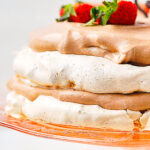 chocolate meringue cake on a cake stand