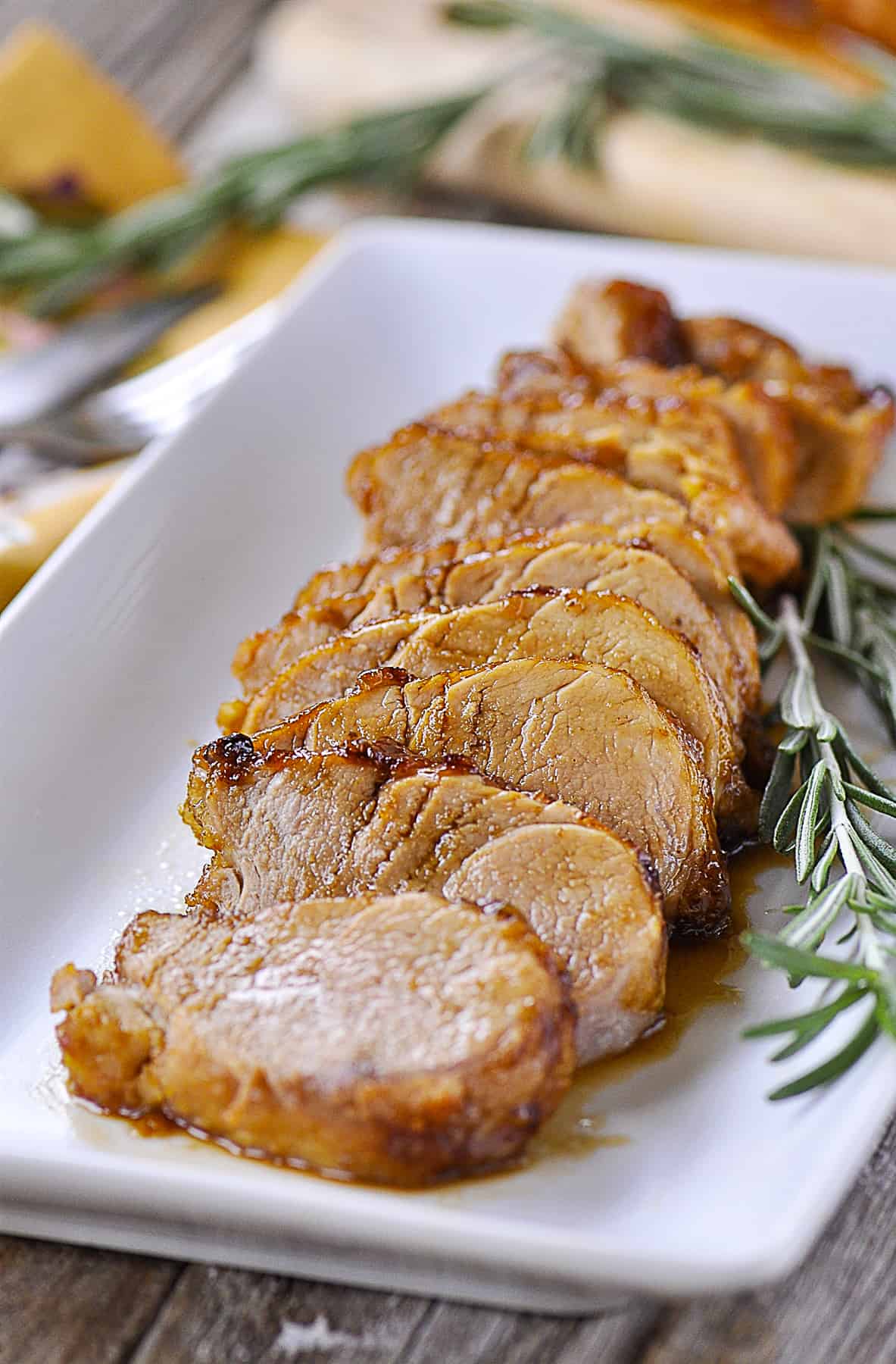 sliced pork tenderloin on a plate