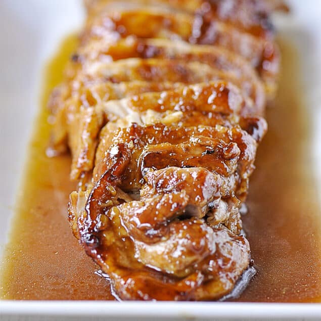 Maple glazed pork tenderloin on a plate