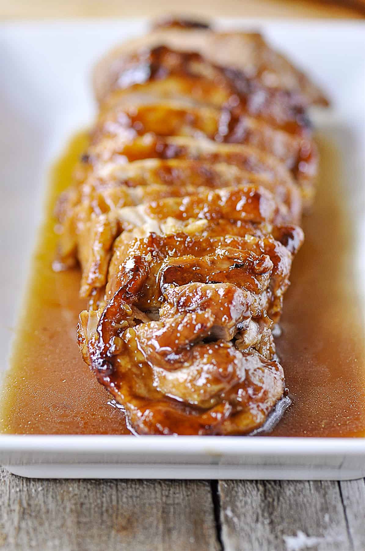 Maple glazed pork tenderloin on a plate