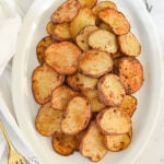 overhead shot of spicy potatoes on a plate