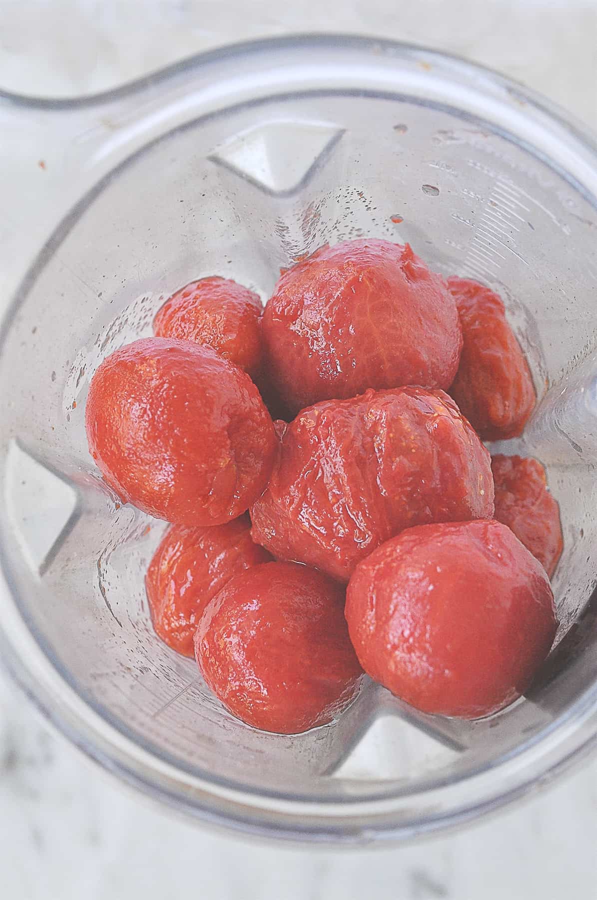 peeled tomatoes in a blender