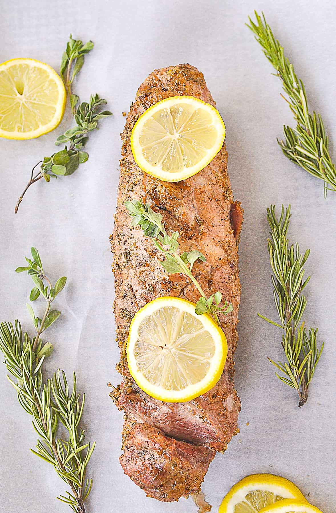 overhead shot of lemon pork tenderloin with lemons on top