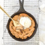 peanut butter skillet cookie with ice cream on top.