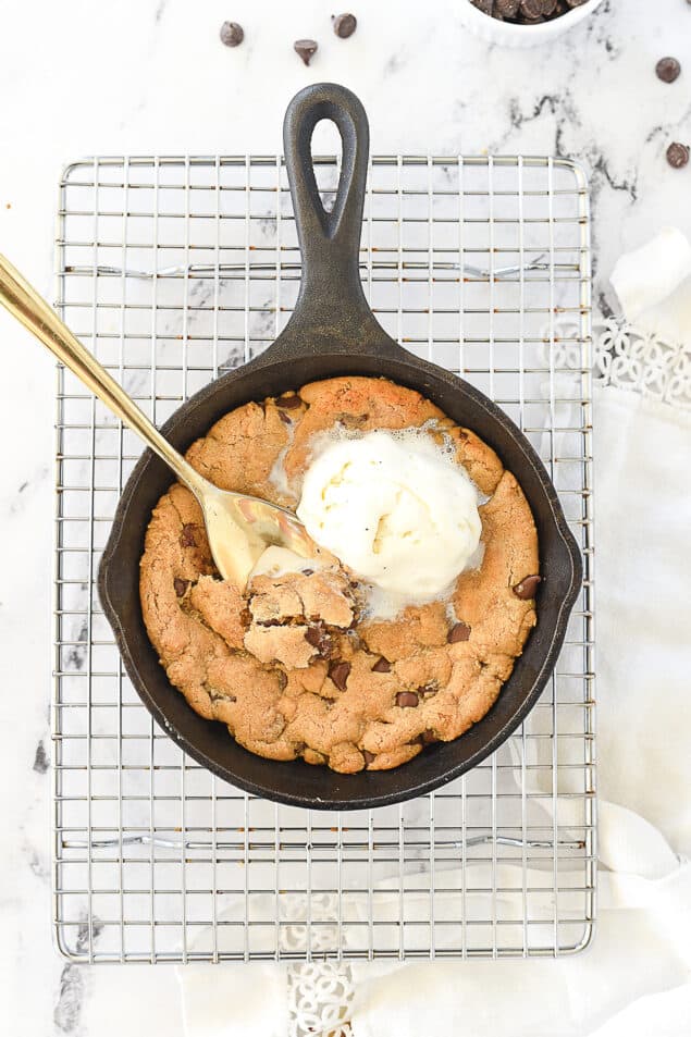 peanut butter skillet cookie with ice cream on top.