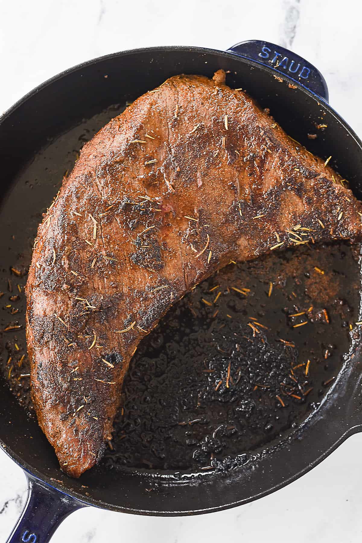 seared tri tip in cast iron pan