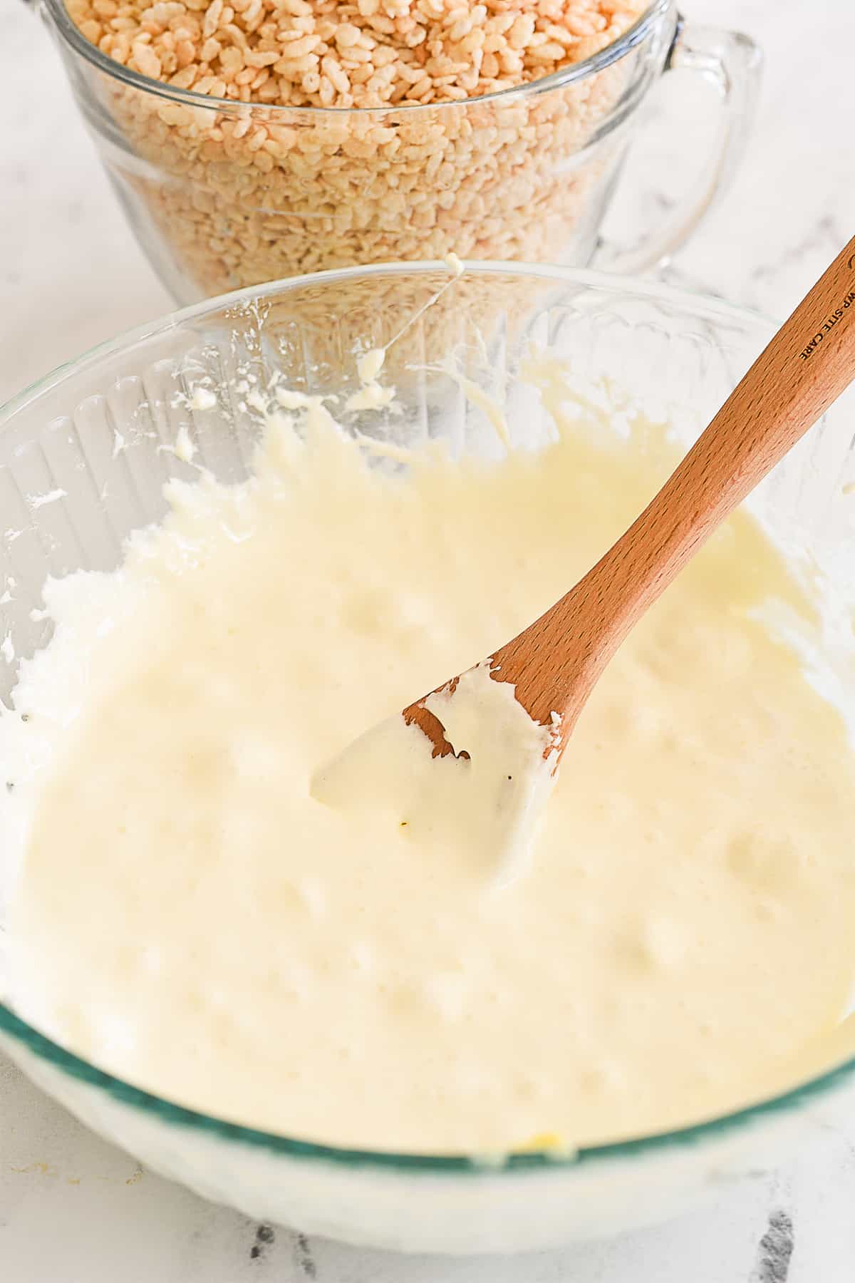 melted marshmallows and butter in a bowl