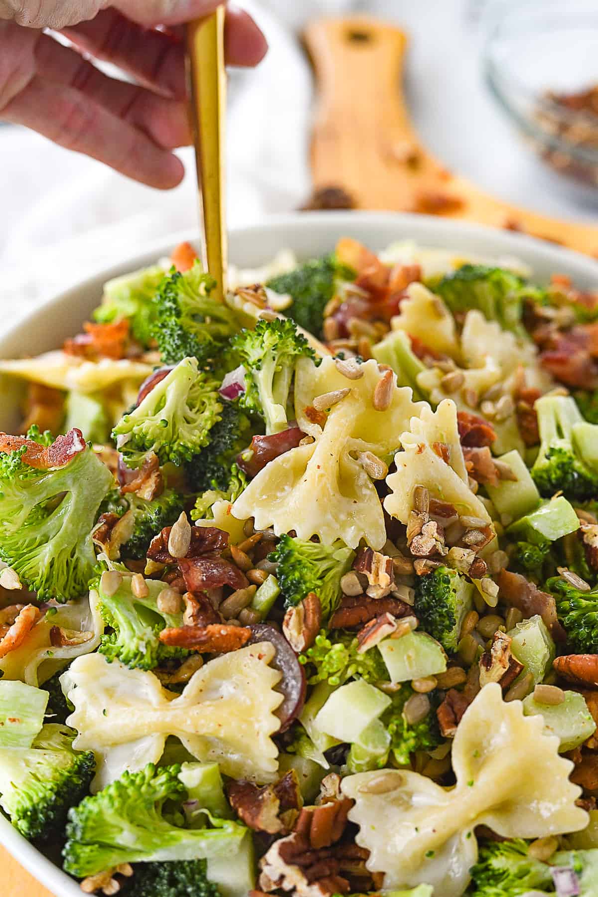 spoon in broccoli pasta salad