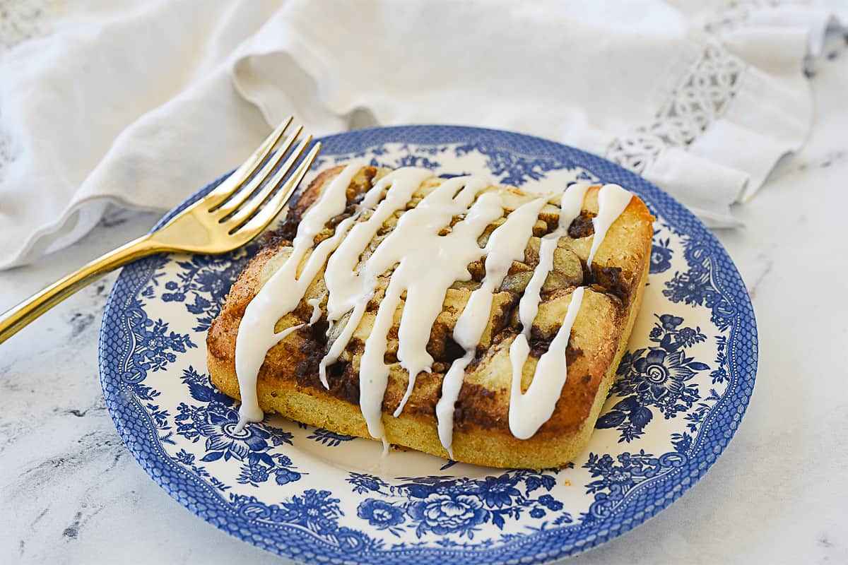 cinnamon swirl cake for two on a plate with a fork