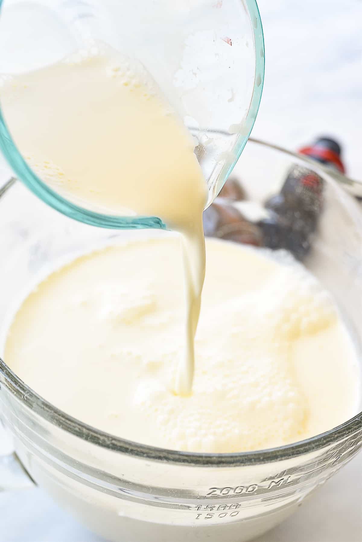 pouring milk into a bowl