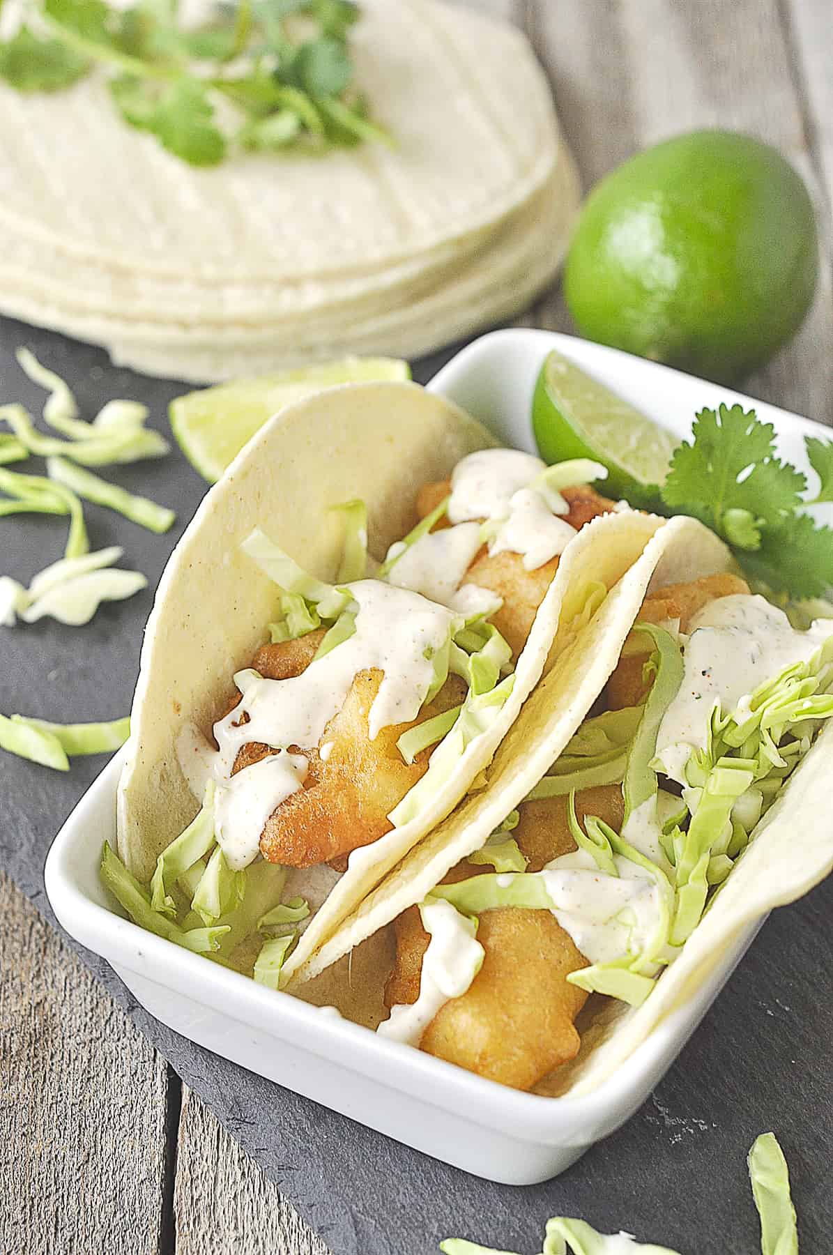 fish tacos with slaw on top