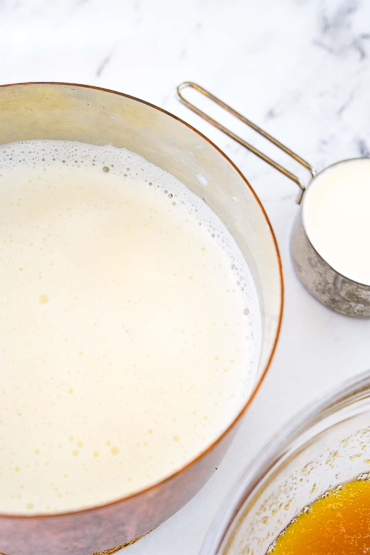 heated milk in a pan