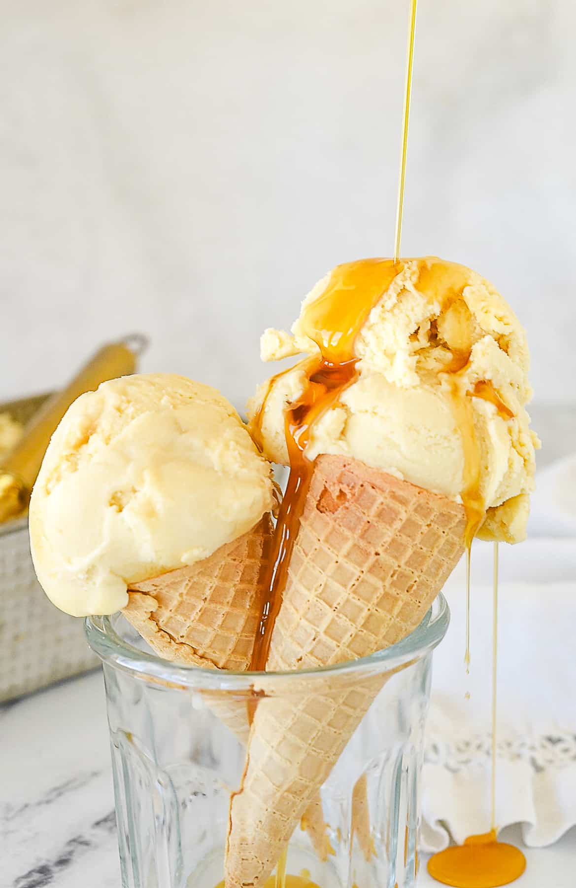 maple syrup pouring over an ice crea cone