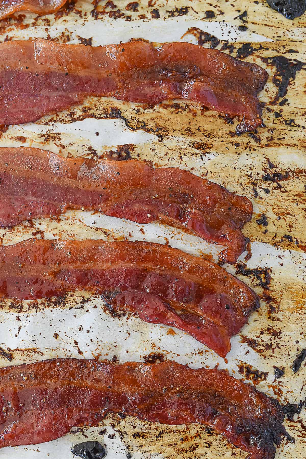 sugared bacon on a baking sheet