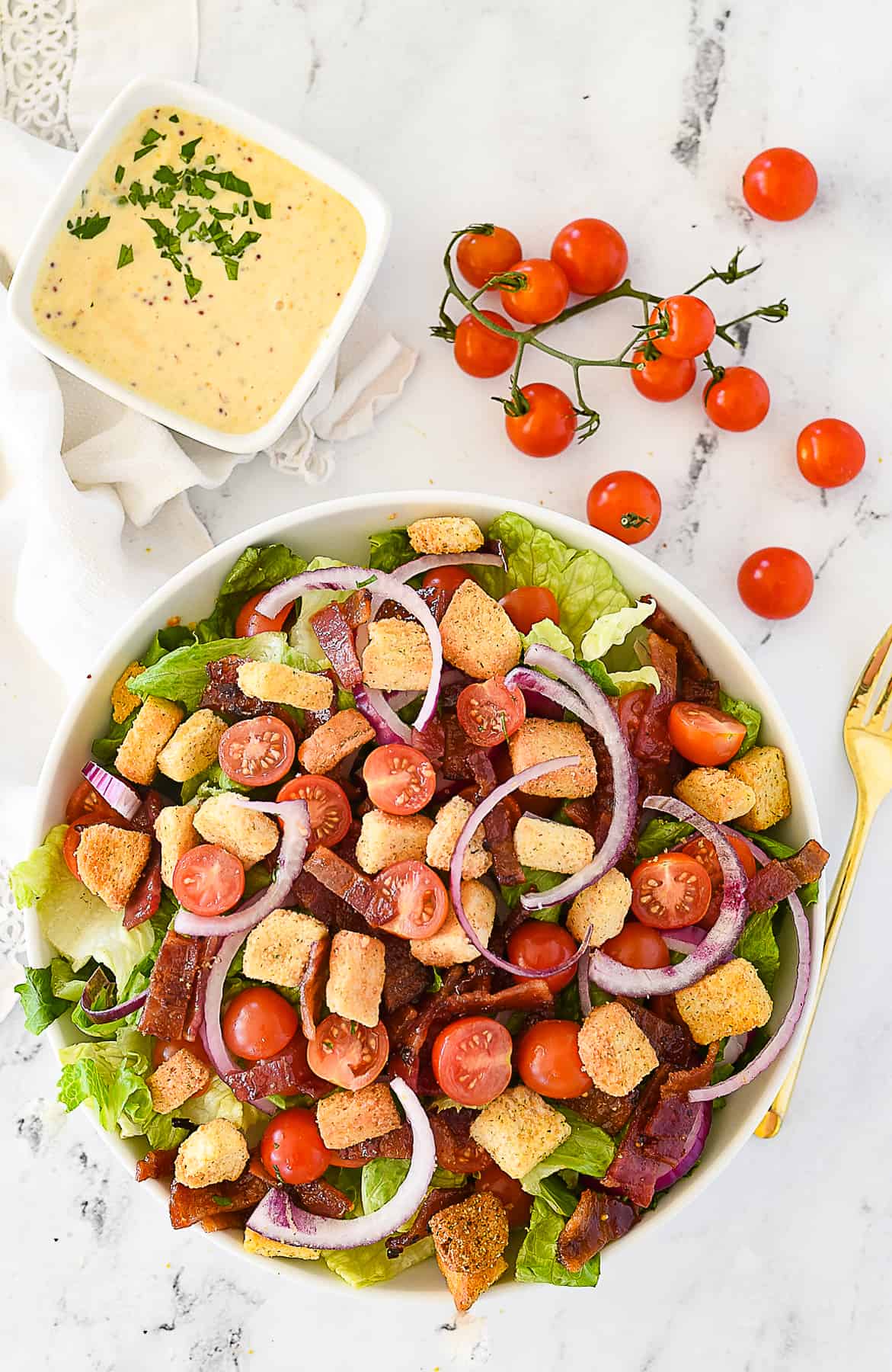 assembling a blt salad