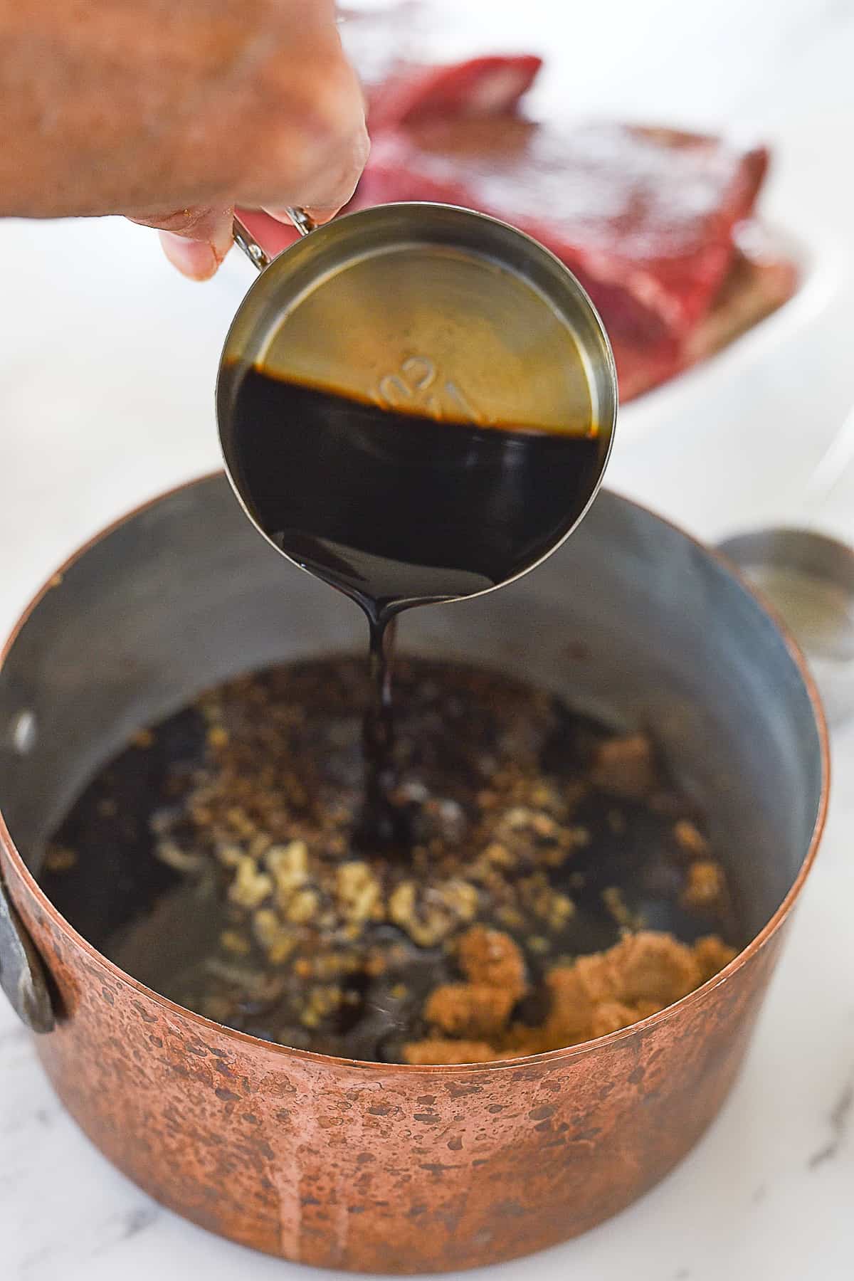adding soy sauce to korean bbq beef sauce