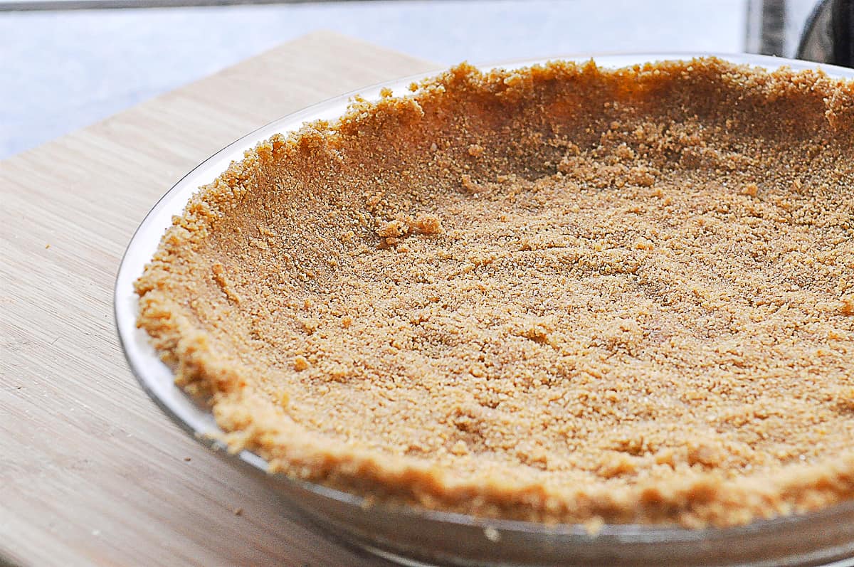 graham cracker crust in a pie dish