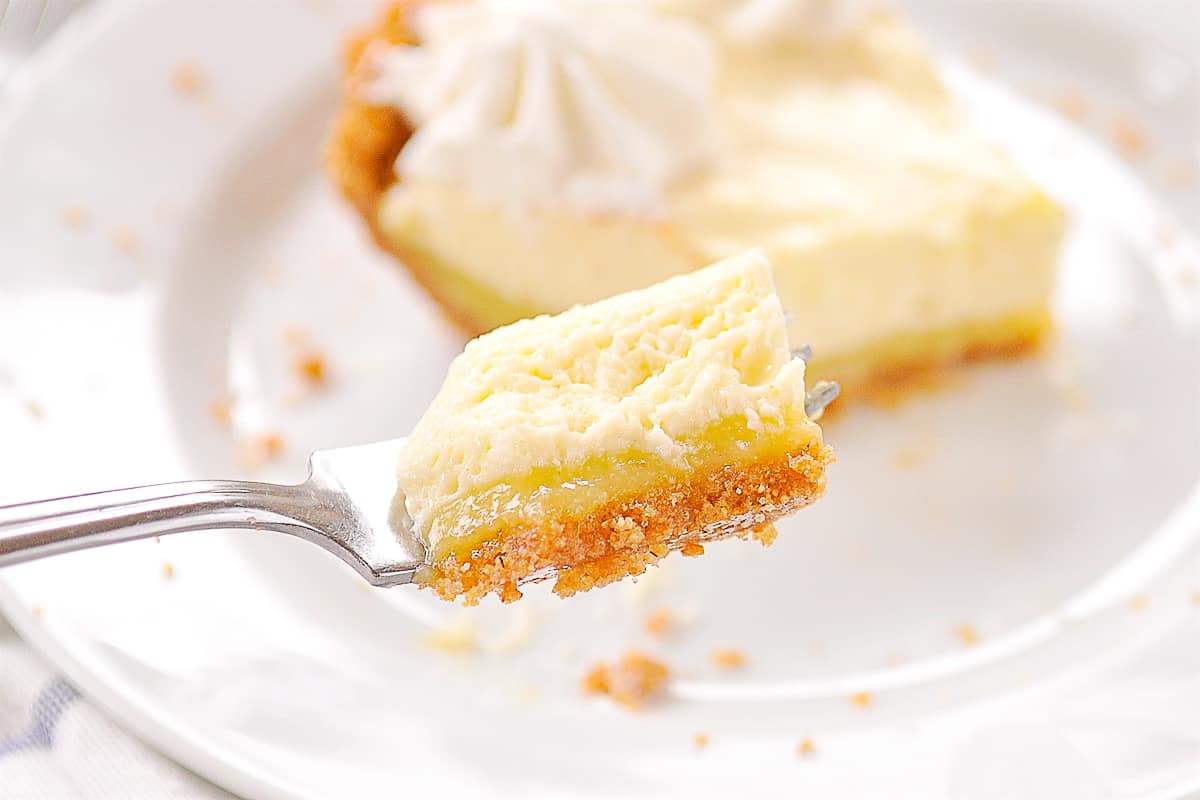 fork full of lemon chiffon pie