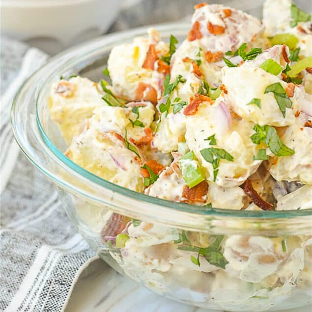 bowl of potato salad in a clear bowl