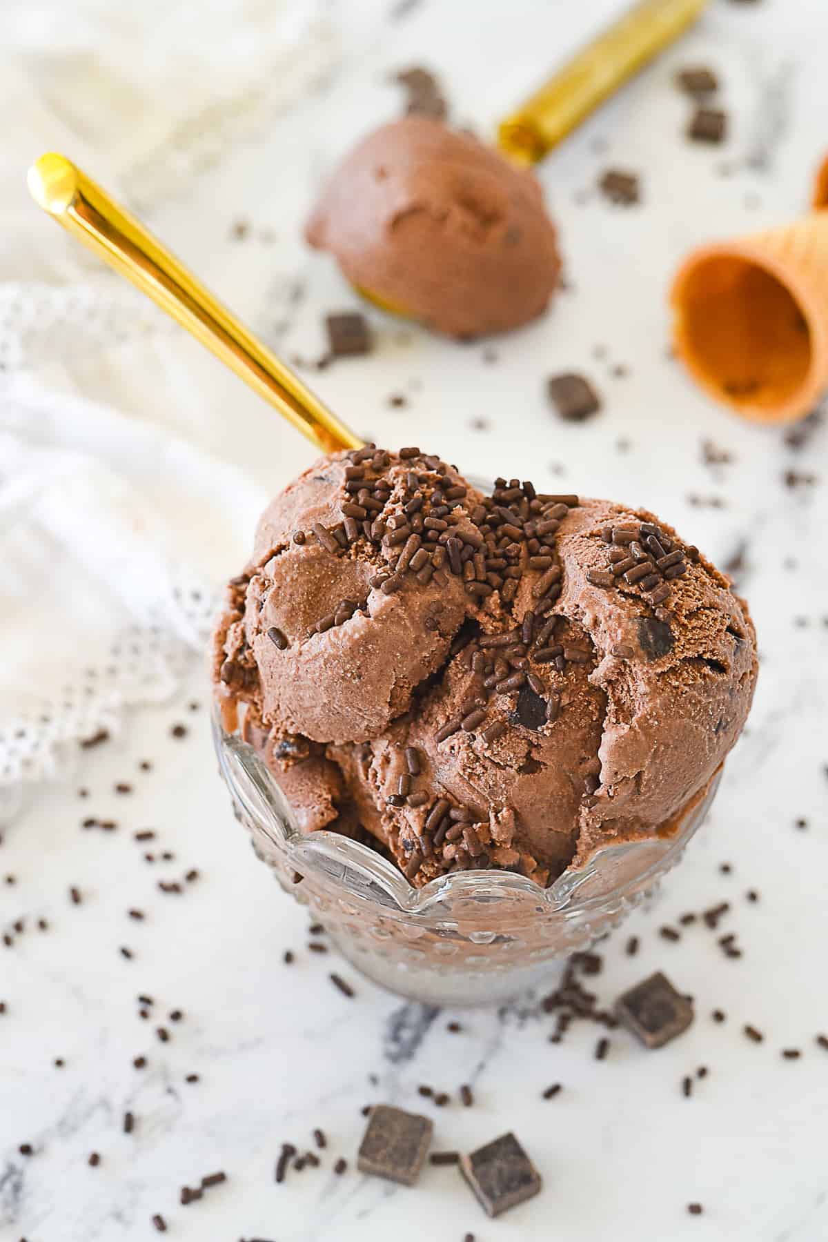 overhead shot of chocolate ice cream in a bowl.