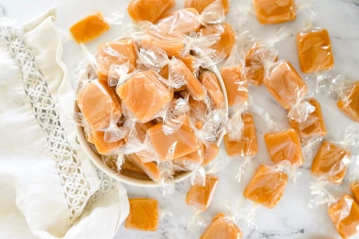 overhead shot of a bowl of homemade caramels
