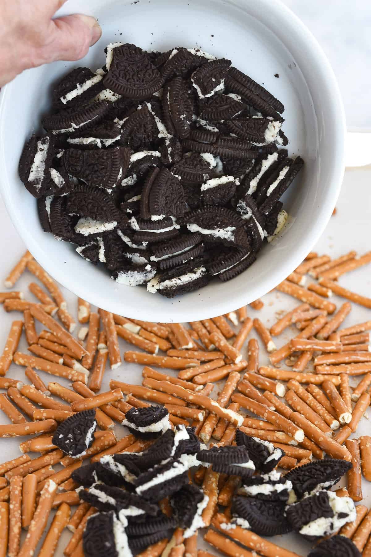 pouring cookies on cookie bark