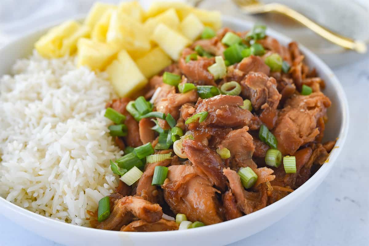 white bowl of hawaiian chicken in the crock pot
