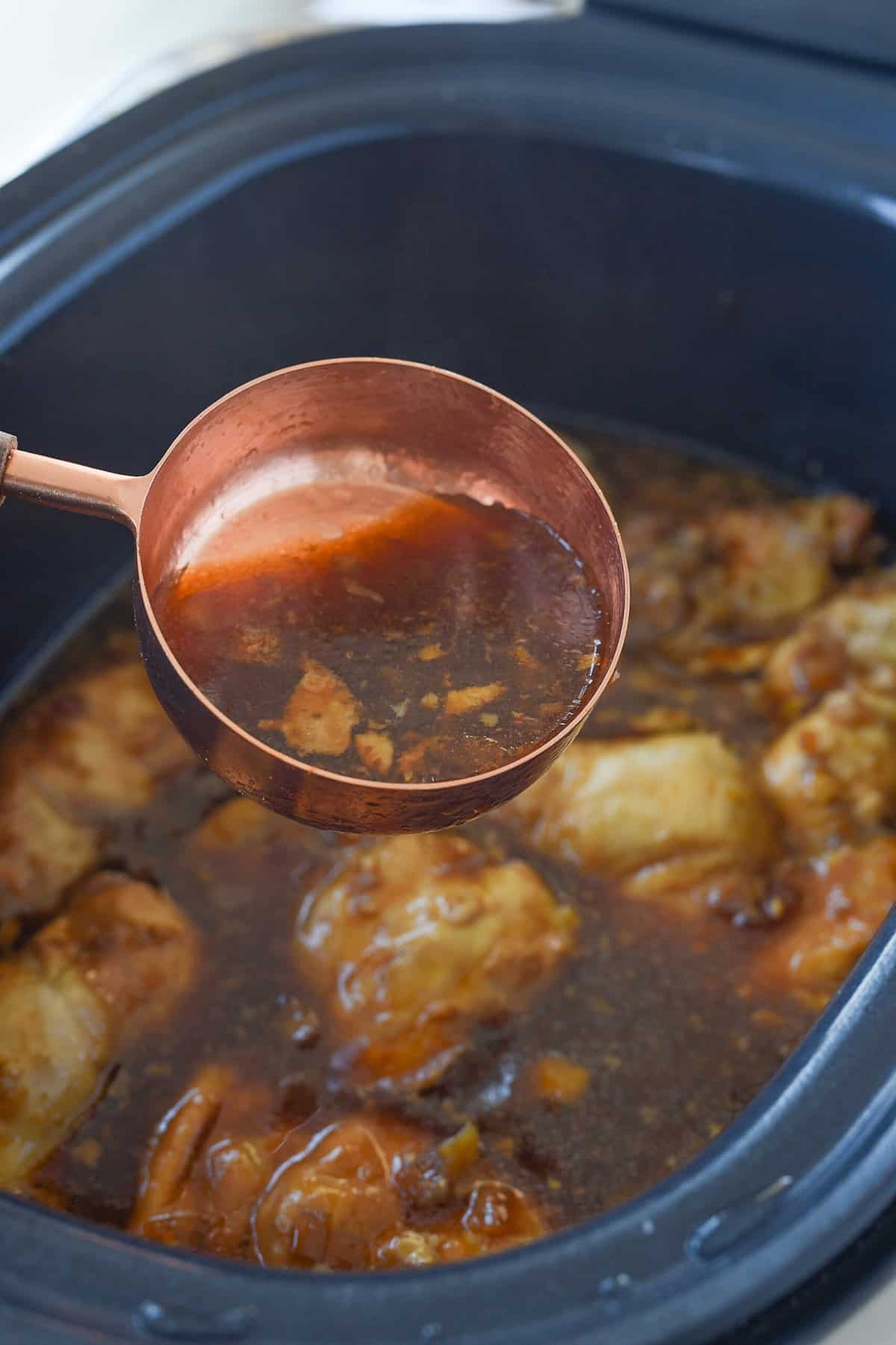 removing iquid from crock pot.