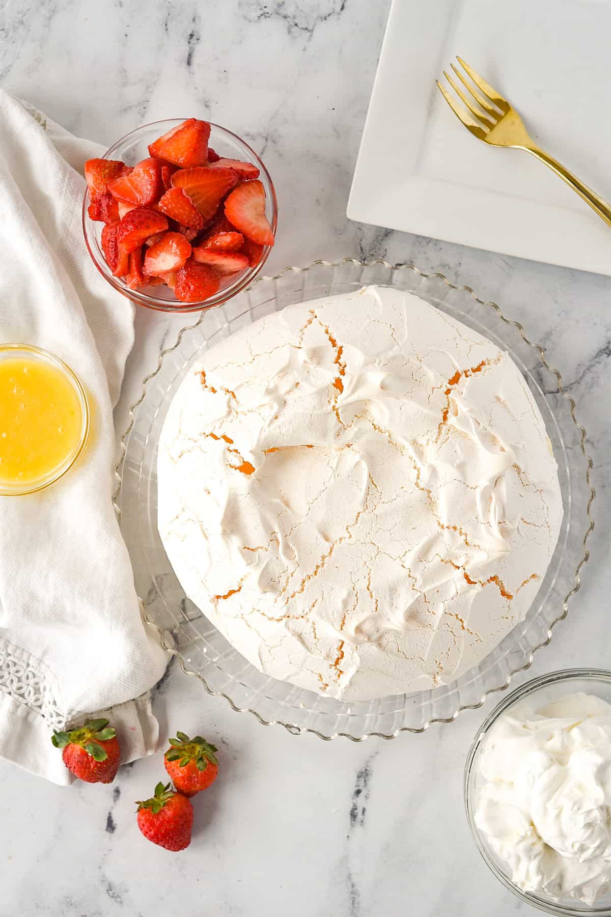 ready to add toppings to pavlova