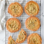 OVERHEAD SHOT OF SIX CHOCOLATE CHIP COOKIES