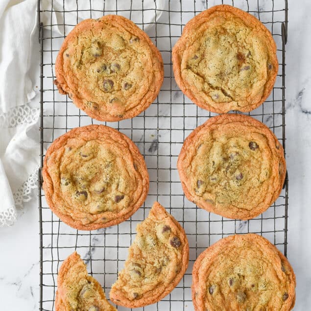 OVERHEAD SHOT OF SIX CHOCOLATE CHIP COOKIES