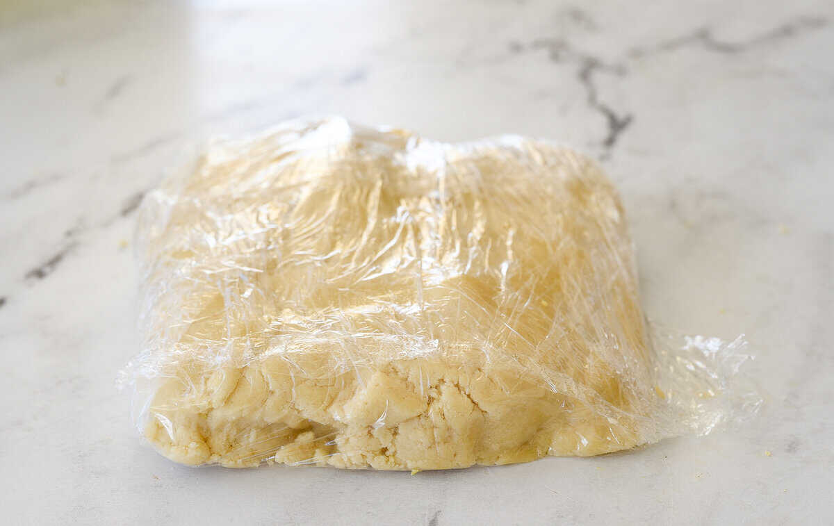 tart dough wrapped in plastic wrap