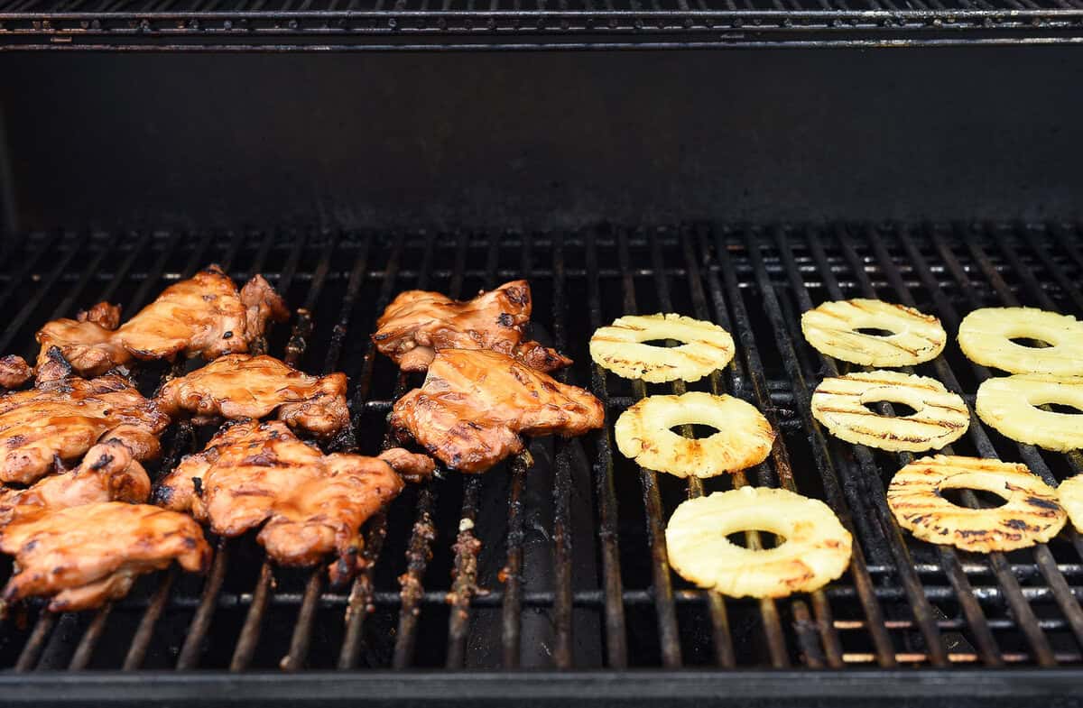 grilling chicken and pineapple.