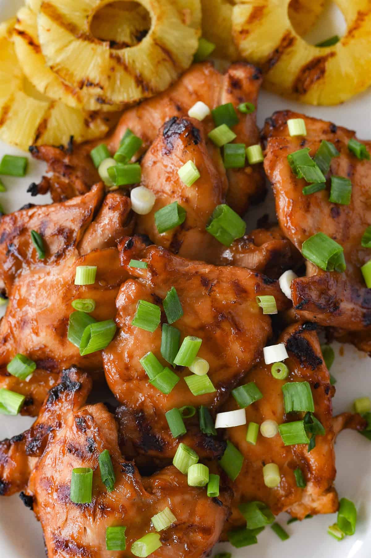 close up of huli huli chicken on a plate