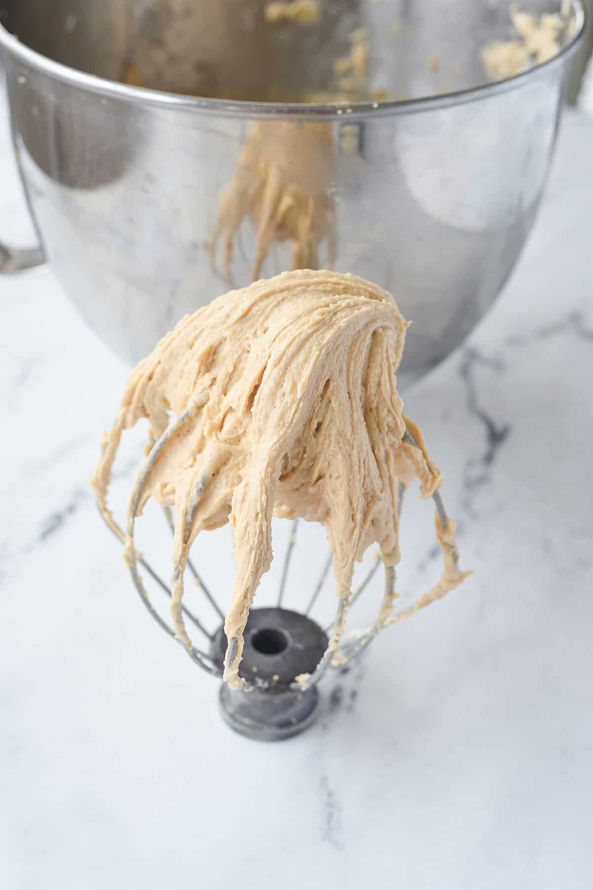 caramel frosting on whisk