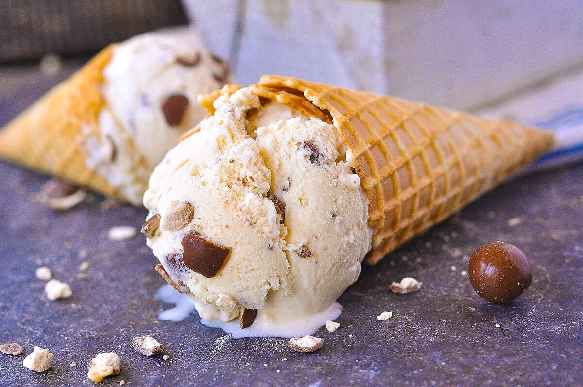 two cones with malted milk ice cream on them