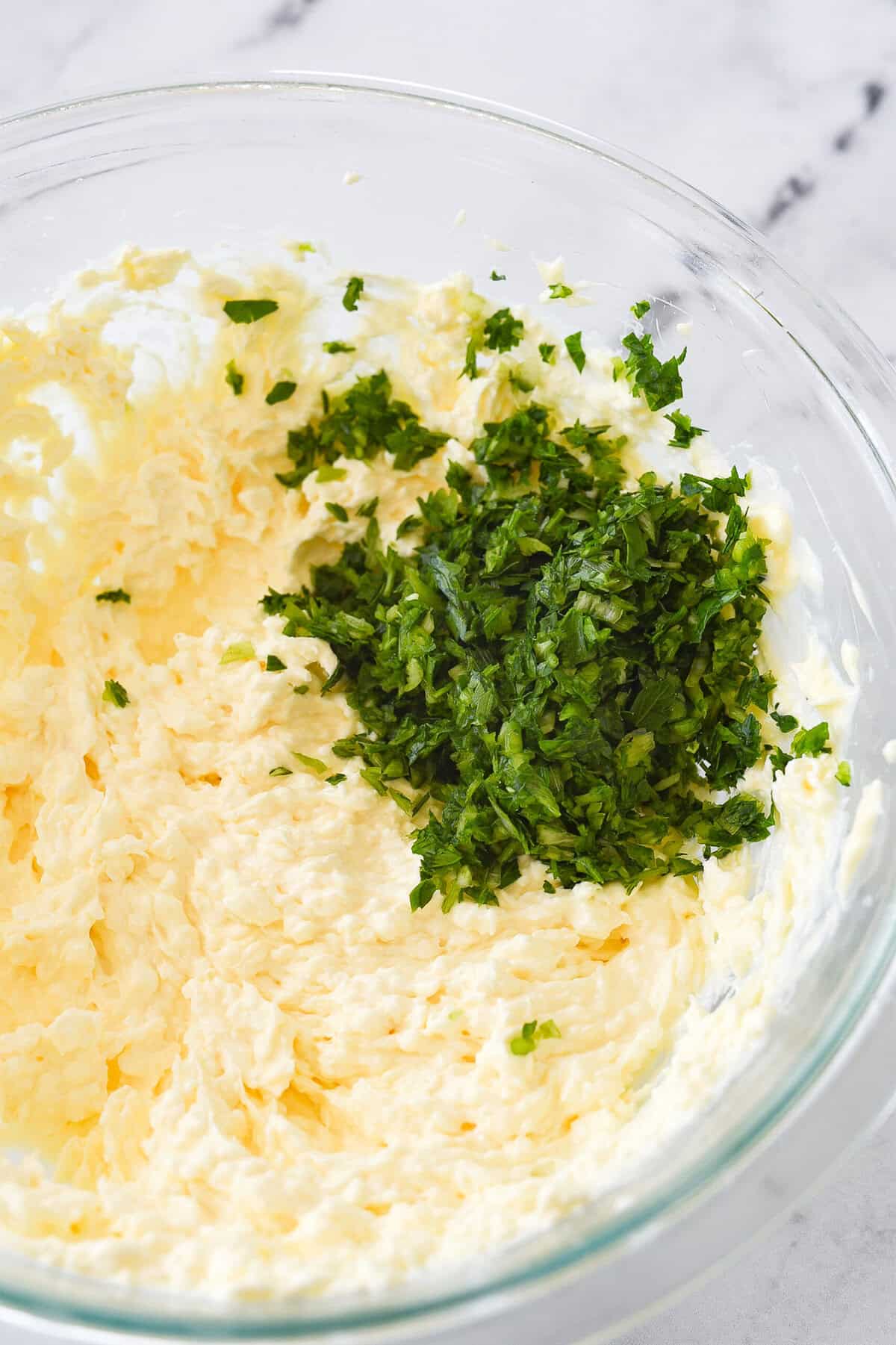 chopped parsley in cream cheese mixture