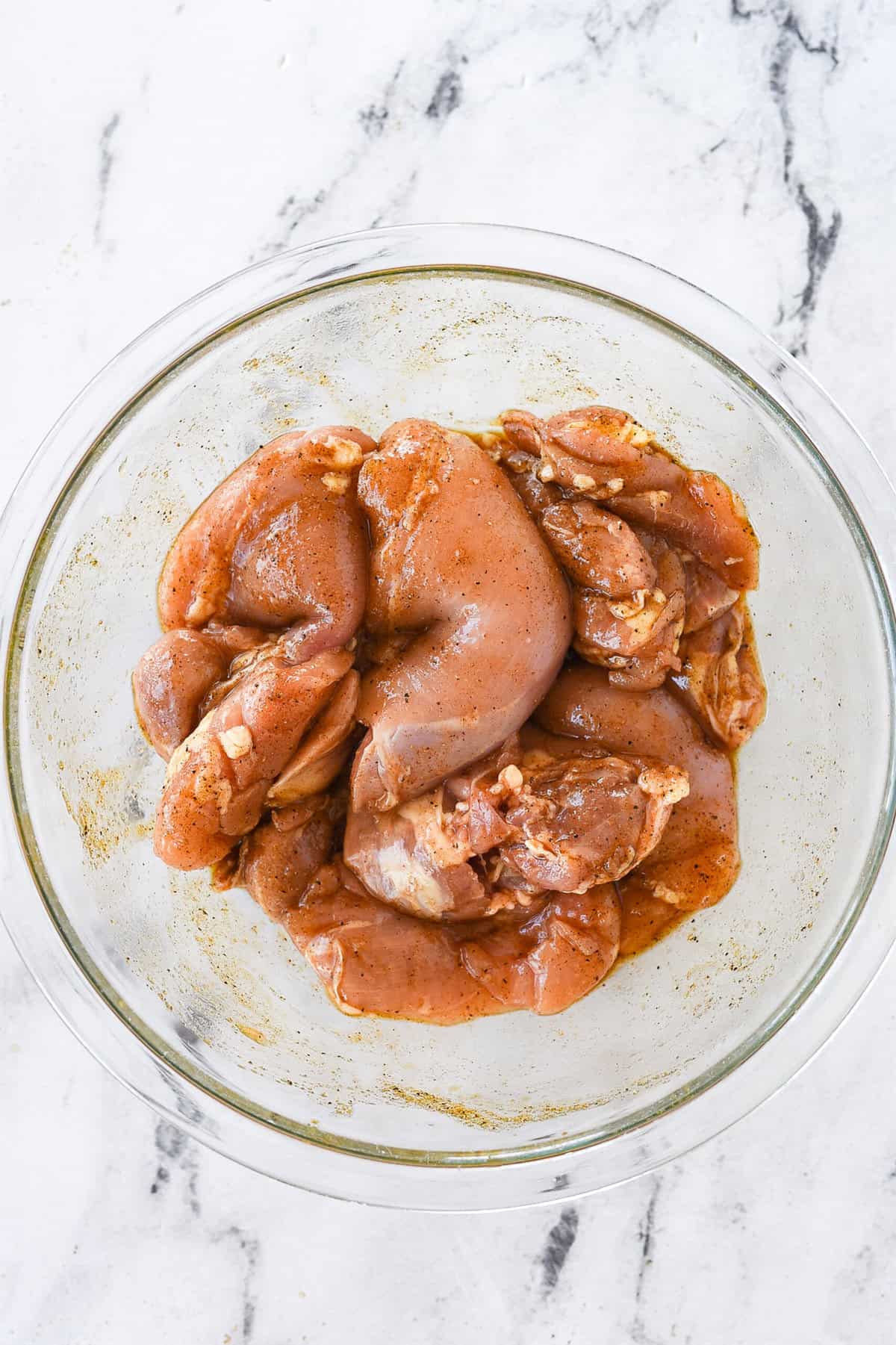 chicken covered in spices.