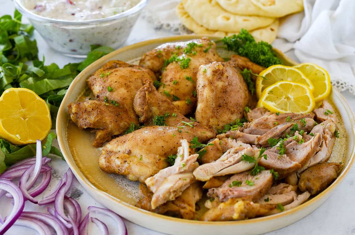 chicken shawarma on a plate sliced
