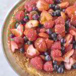 overehead shot of almond cake with berries on top
