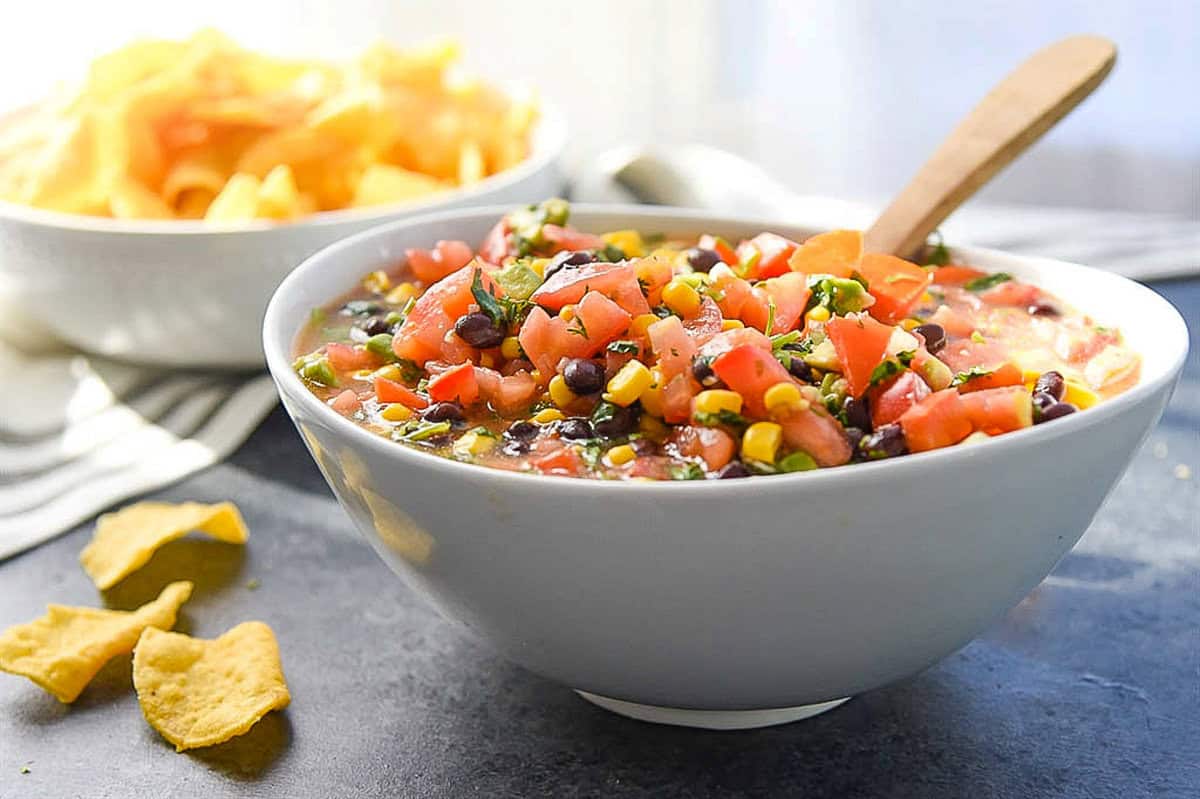 bowl of cowboy  caviar
with a spoon in it
