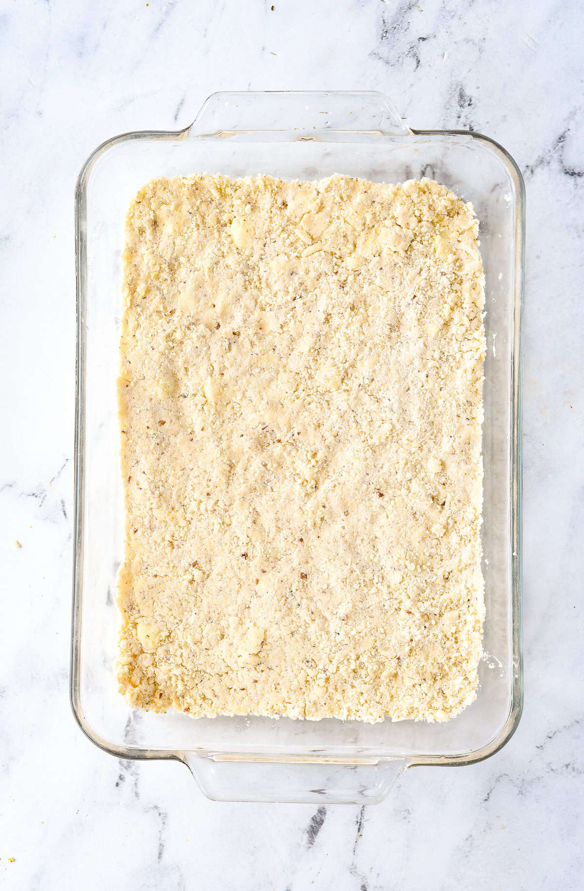 shortbread pressed into bottom of 9 x 13 inch pan