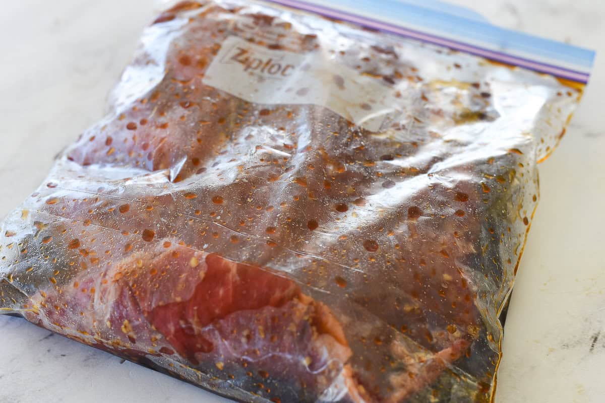 flank steak marinading in bag
