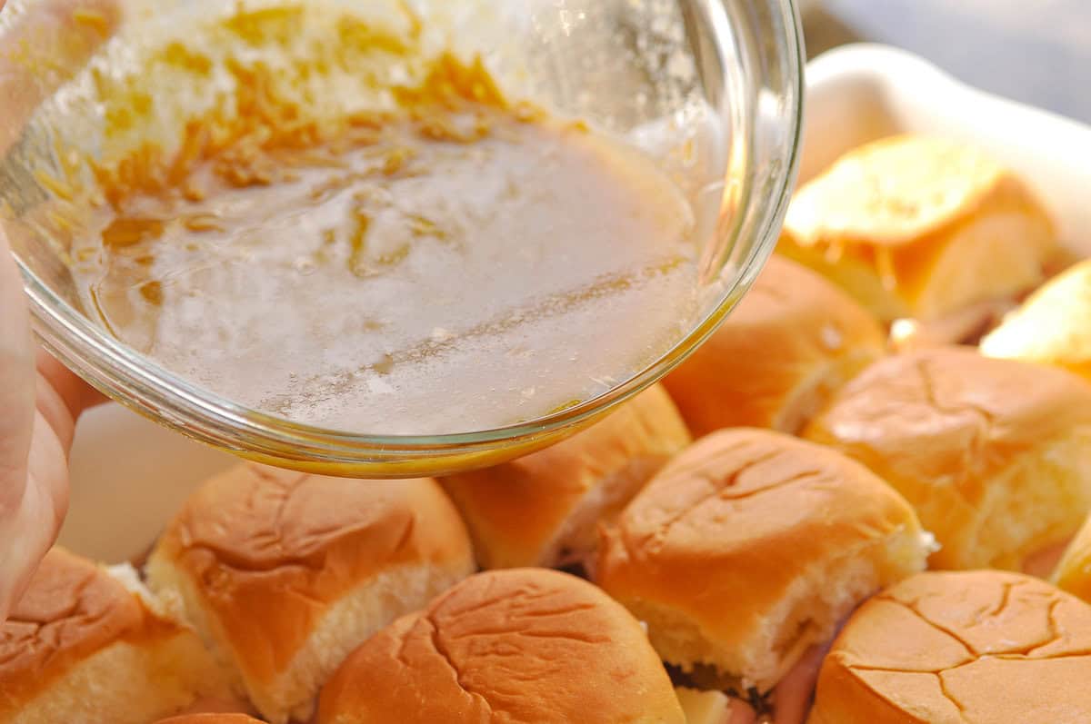 pouring liquid mixture over slide buns