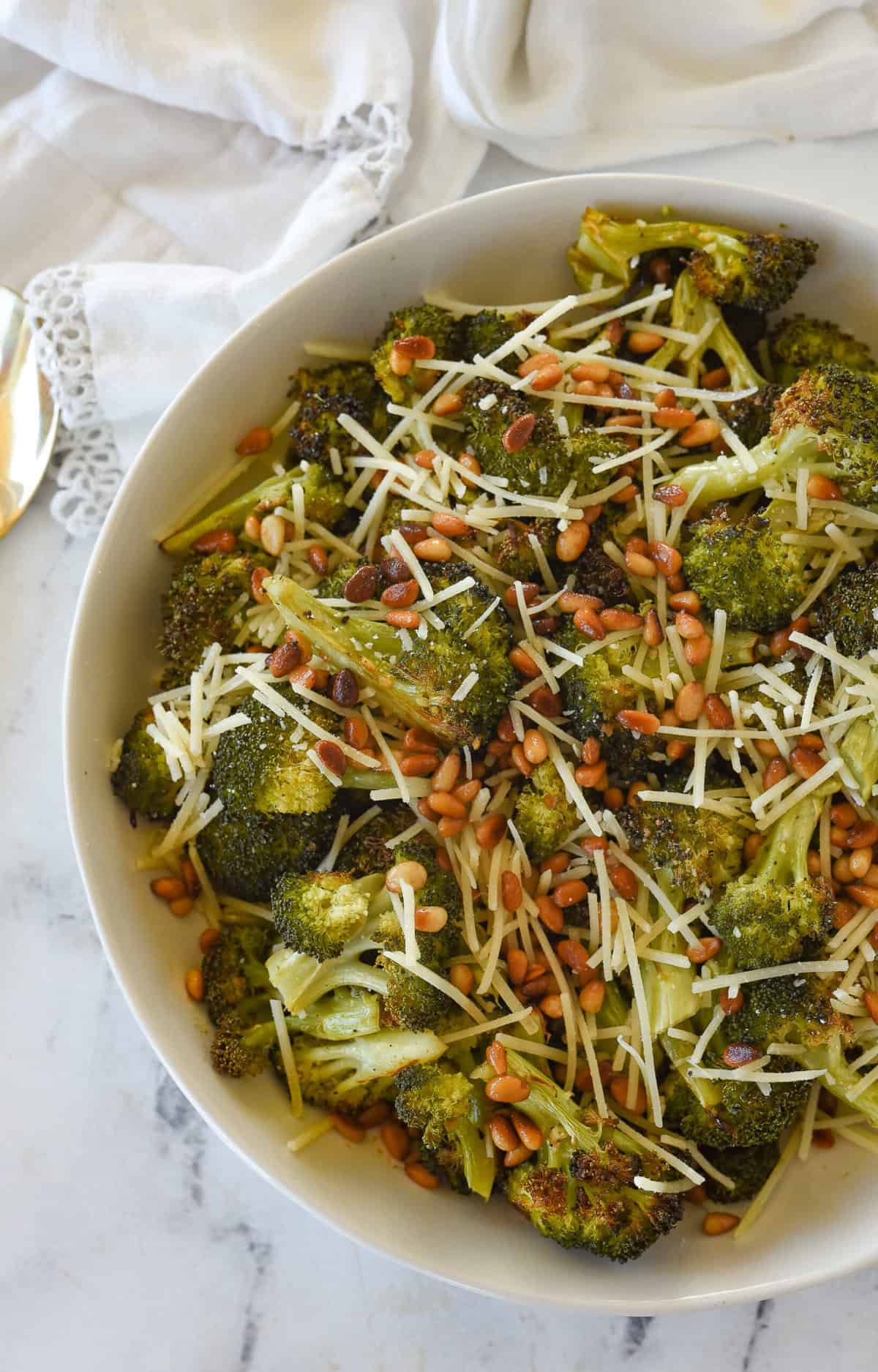 overhead shot of roastede broccoli in a bowl.
