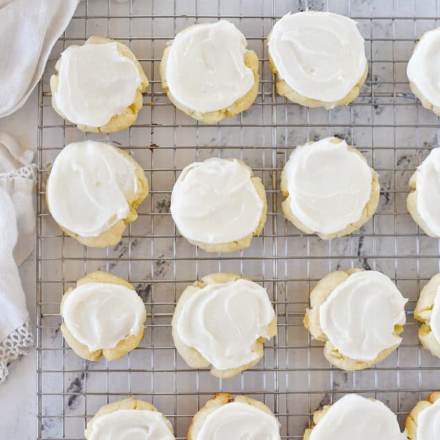 almond sugar cookies on cooling rack